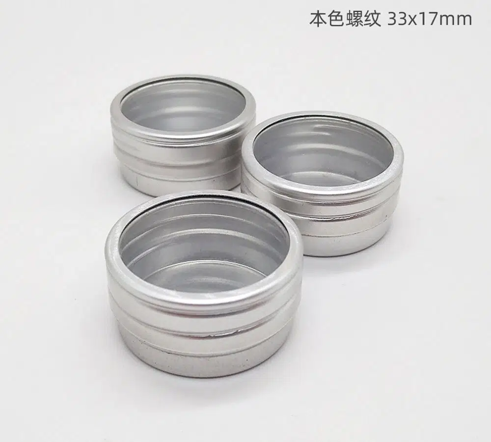 This 10g container with a PVC window is normally made of a 0.3mm-thickness aluminum sheet, with a size of Dia33* H16 mm, it can be thicker according to the customers' requirement. Its opening is smooth and strong enough. It can be decorated as silk screen printing, offset printing, labeling, lasering, hot stamping, or plated coating. There are 500+ existing metal bottles here, contact us for free samples and more information.