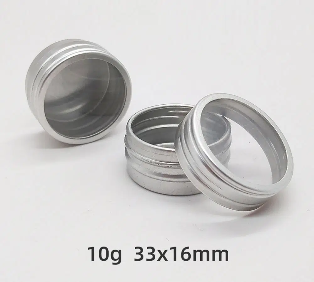 This 10g container with a PVC window is normally made of a 0.3mm-thickness aluminum sheet, with a size of Dia33* H16 mm, it can be thicker according to the customers' requirement. Its opening is smooth and strong enough. It can be decorated as silk screen printing, offset printing, labeling, lasering, hot stamping, or plated coating. There are 500+ existing metal bottles here, contact us for free samples and more information.