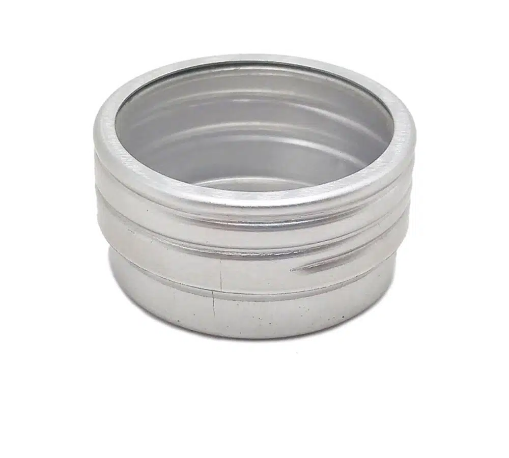 This 10g container with a PVC window is normally made of a 0.3mm-thickness aluminum sheet, with a size of Dia33* H16 mm, it can be thicker according to the customers' requirement. Its opening is smooth and strong enough. It can be decorated as silk screen printing, offset printing, labeling, lasering, hot stamping, or plated coating. There are 500+ existing metal bottles here, contact us for free samples and more information.